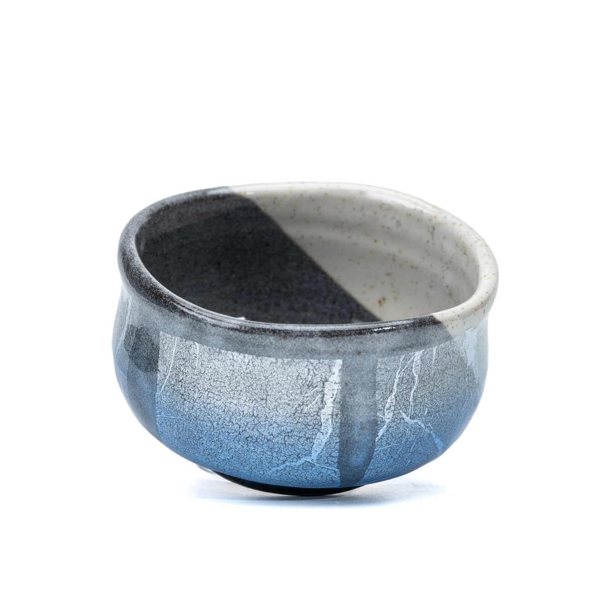 Top view of the bowl's divided dark gray and cream interior.