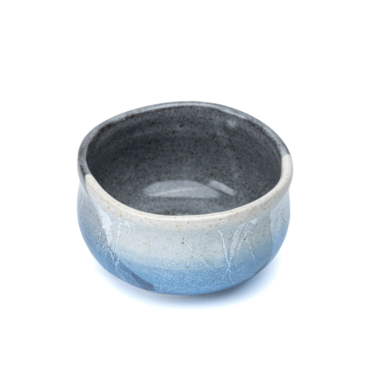 Top view into the gray glazed interior of the matcha bowl.