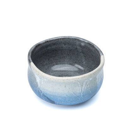 Top view into the gray glazed interior of the matcha bowl.