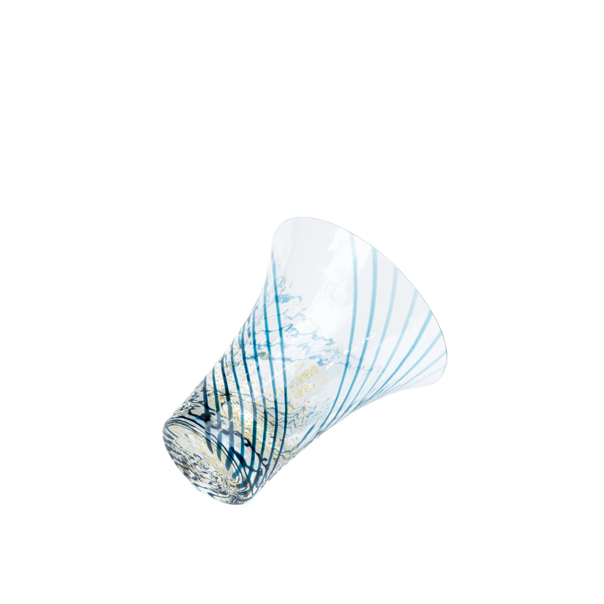 Yachiyo glass sake cup resting on its side, showing the flared shape.