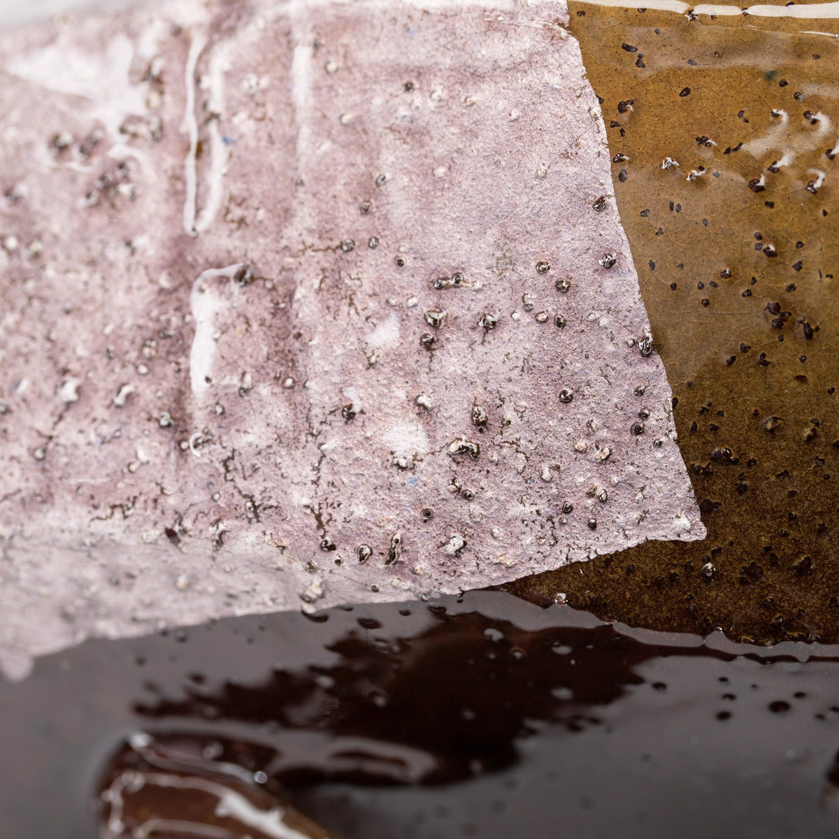 Texture of the lilac silver-foil decoration under glaze.
