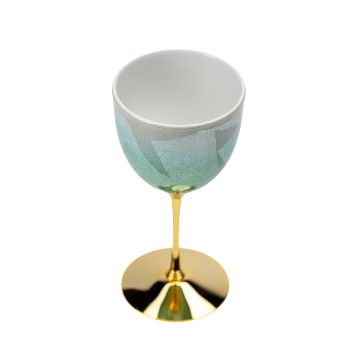 Angled top view of the green Kutani wine cup and its white interior.