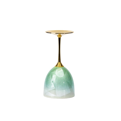 Green Kutani wine cup inverted to show its base and green ceramic bowl.