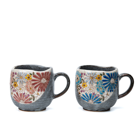 Pair of gray Kutani floral mugs with red and blue flower panels on a white background.