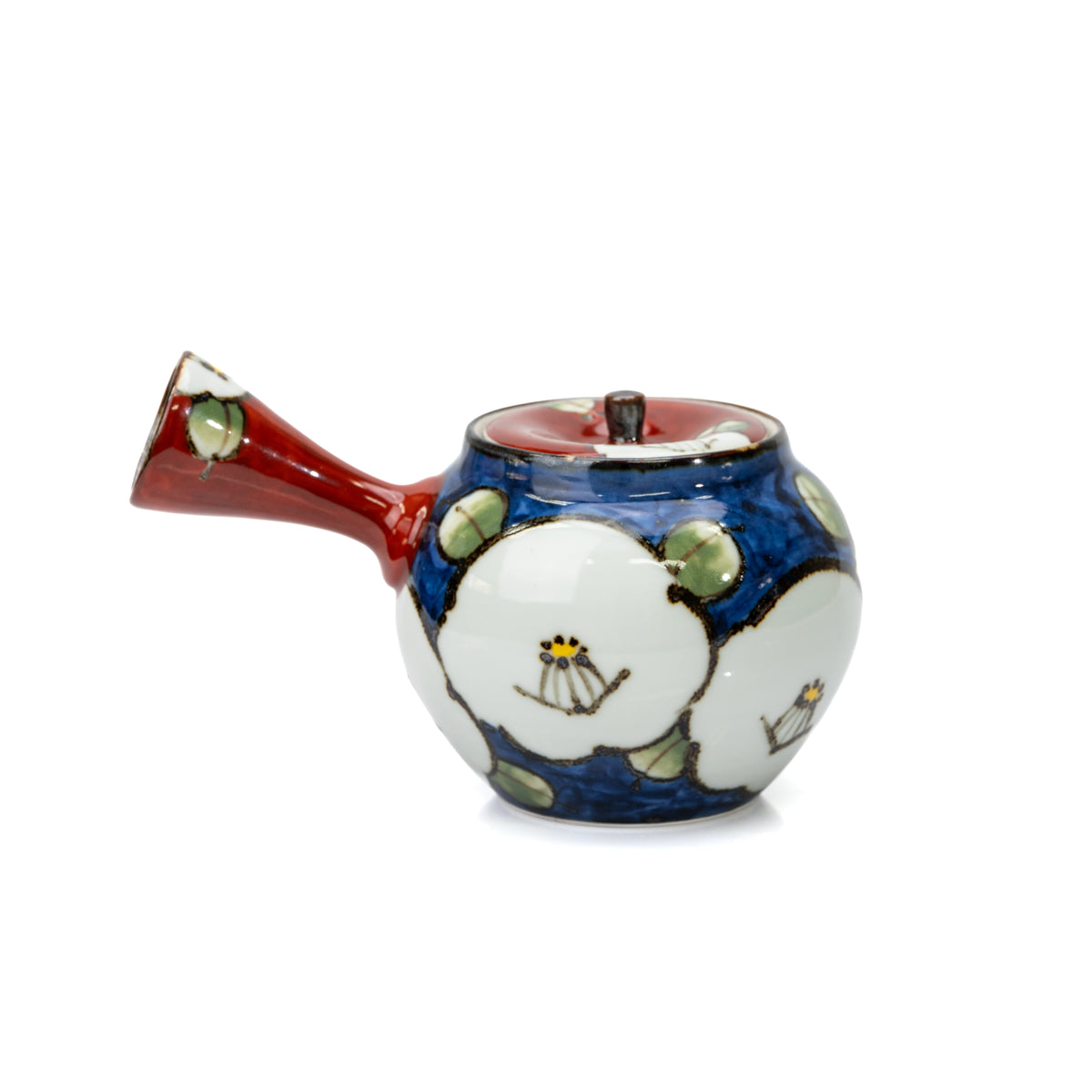 Opposite side of the camellia teapot and its red spout and handle.