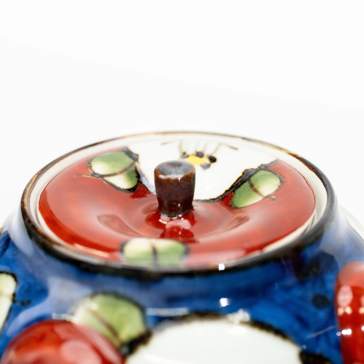 Camellia teapot lid and its small dark knob.