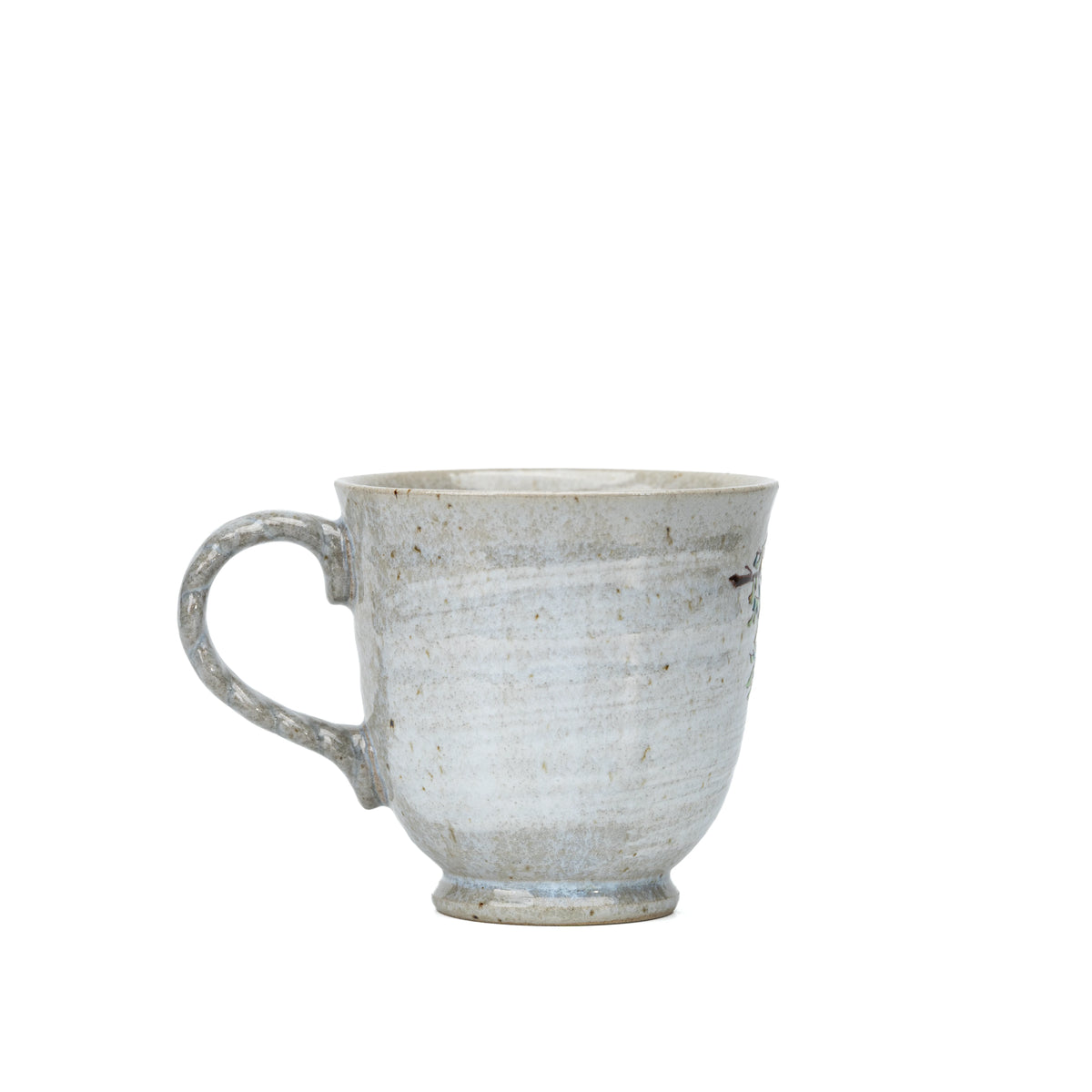 Back view of the Kutani kingfisher mug and its textured handle.