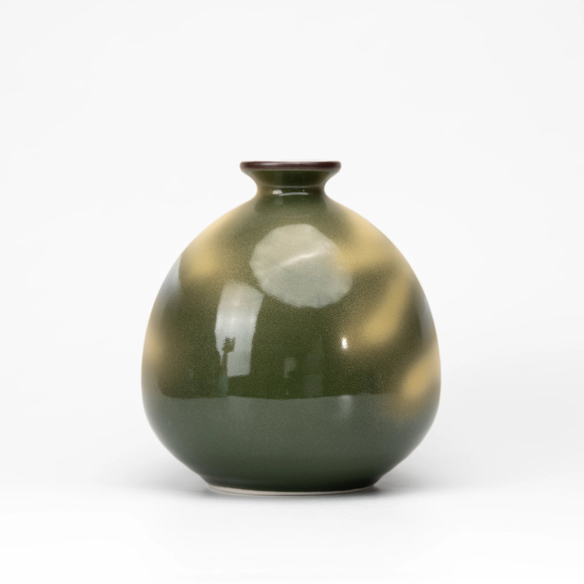 Plain olive-green reverse of the round bud vase.