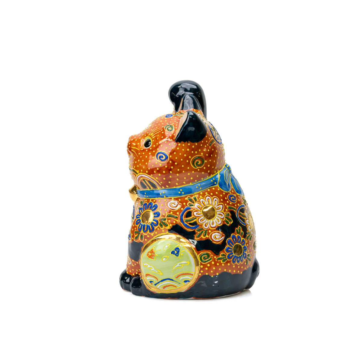 Side view of the lucky cat with a pale green circular panel.
