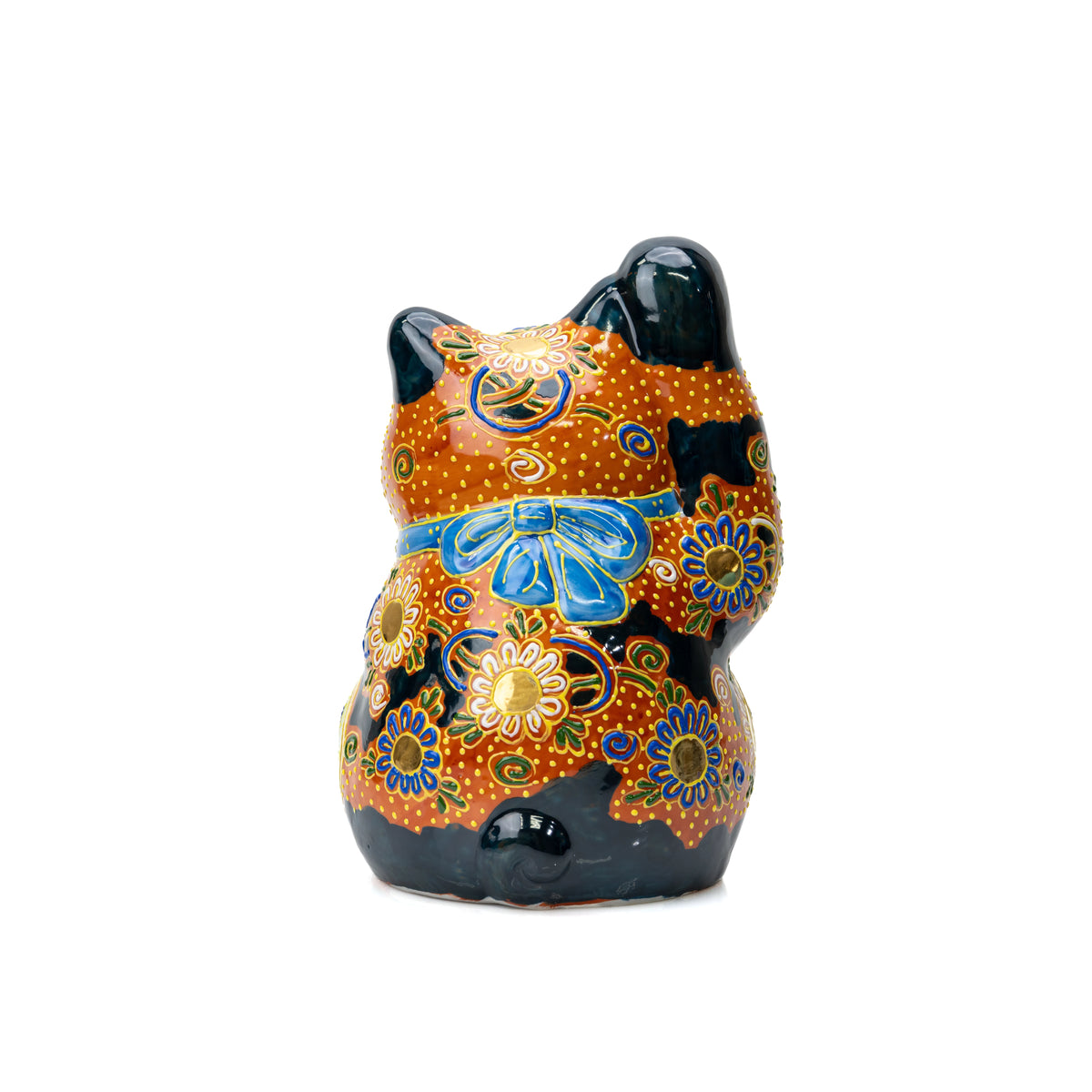 Back of the orange and black lucky cat with a blue bow.