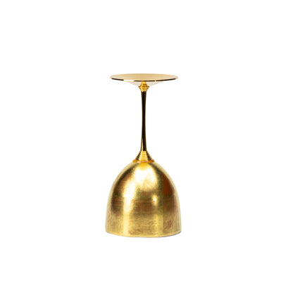 Gold wine cup turned upside down to show its stem and bowl exterior.
