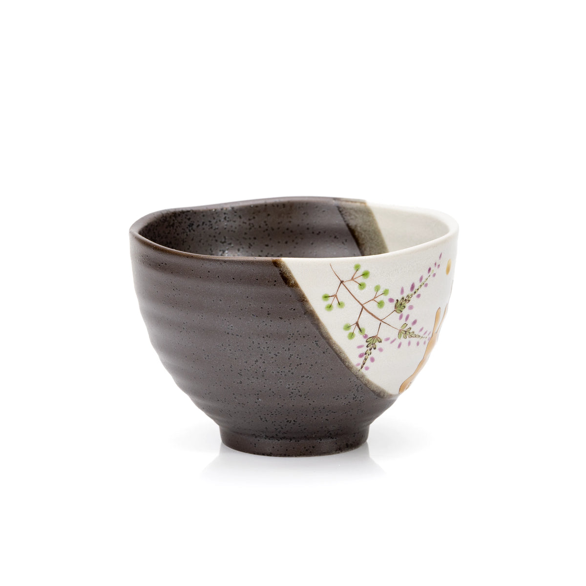 Opposite side of the rabbit bowl with purple flowers and dark glaze.