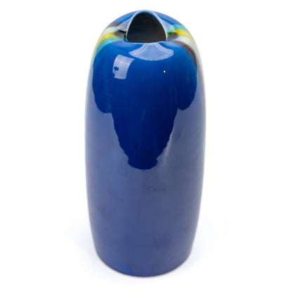 Opposite side of the blue vase, showing its uneven opening.