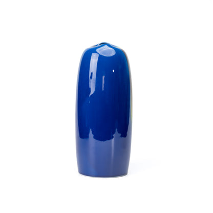 Plain blue side of the tall porcelain vase.
