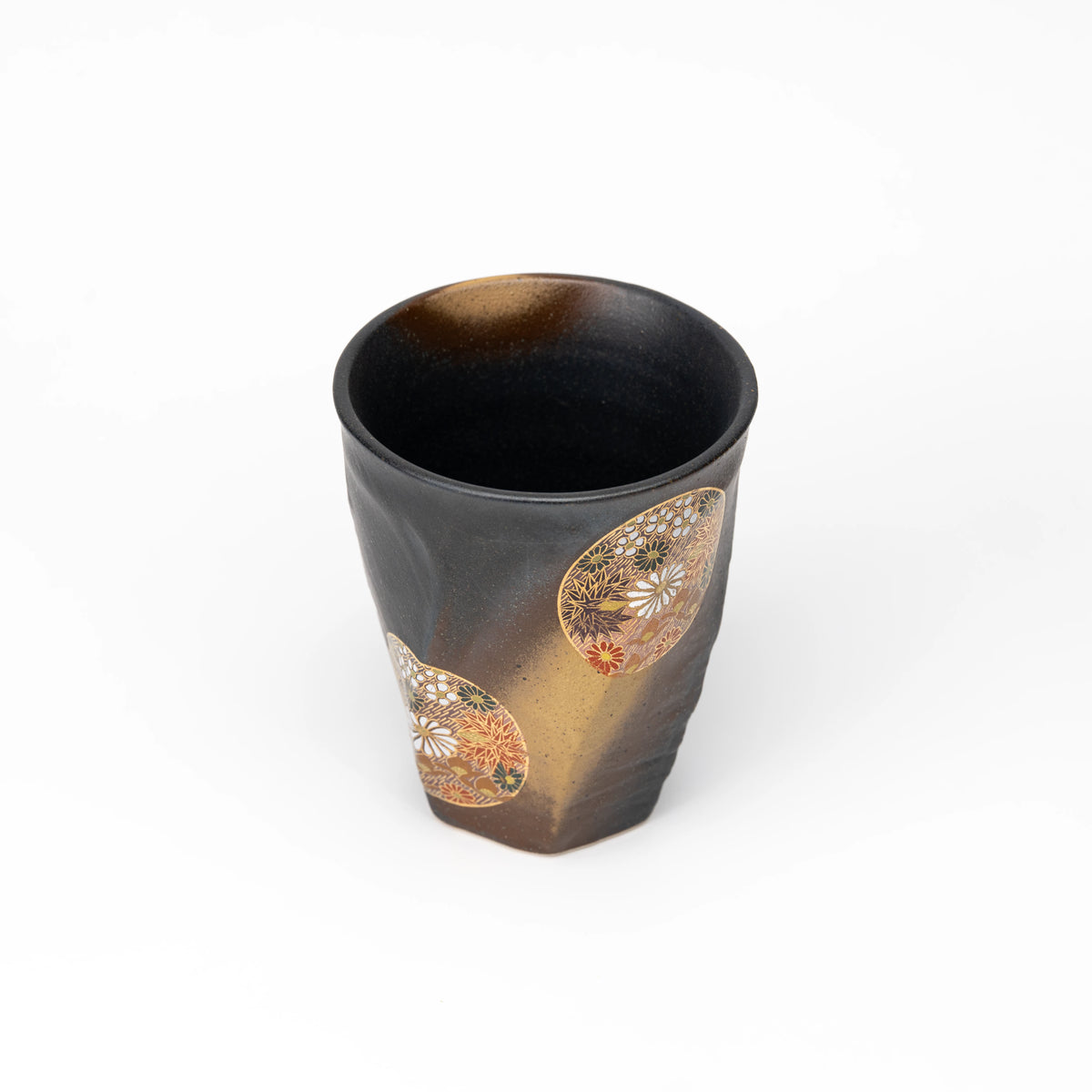 Top view of the black floral Kutani cup.
