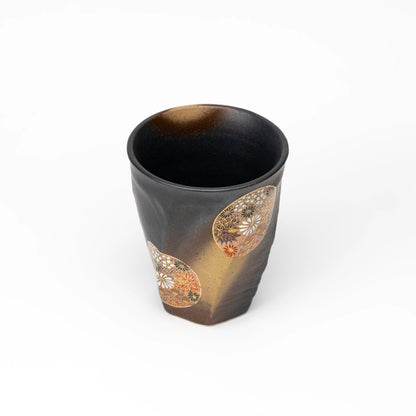 Top view of the black floral Kutani cup.