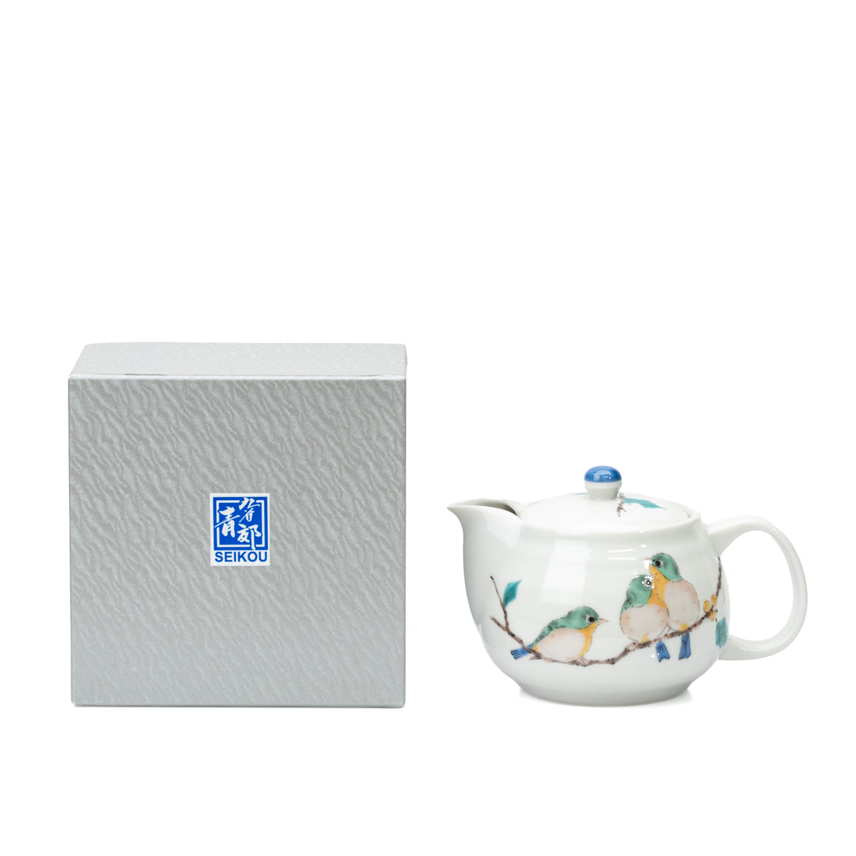 Kutani three-bird teapot beside its gray Seikou box.