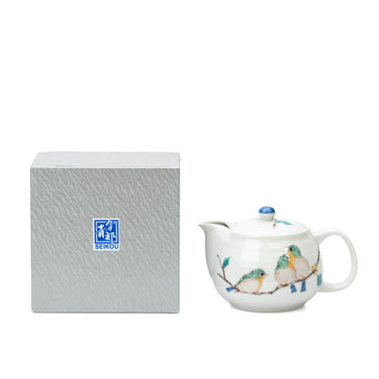 Kutani three-bird teapot beside its gray Seikou box.