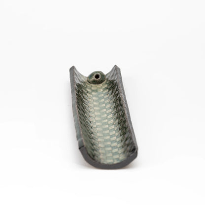 Top view of the green mosaic incense holder without an incense stick.