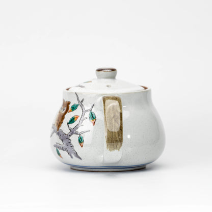 Handle-side view of the Kutani owl teapot.