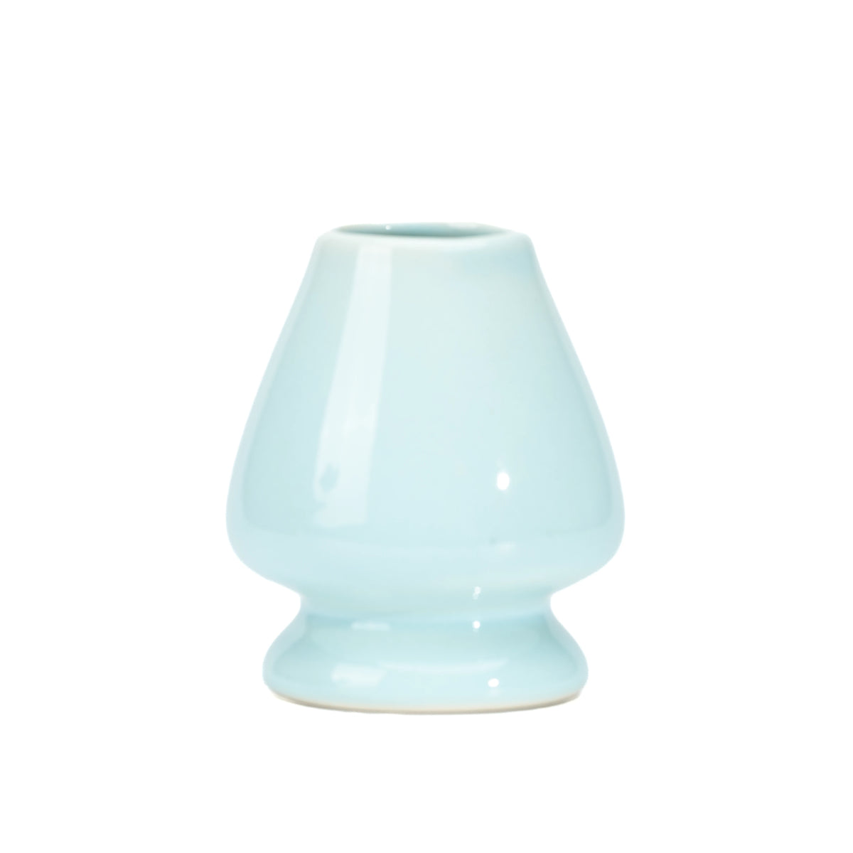 Plain back of the pale blue ceramic whisk holder.