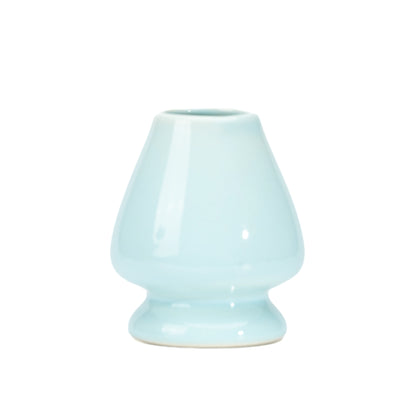 Plain back of the pale blue ceramic whisk holder.