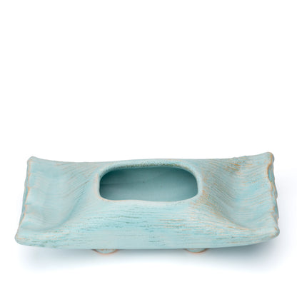 Top view of the pale blue Hechimon vase with its rectangular opening.