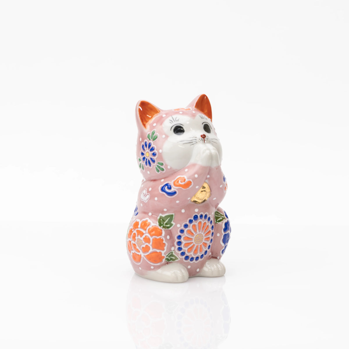 Angled front view of the pink floral praying cat.