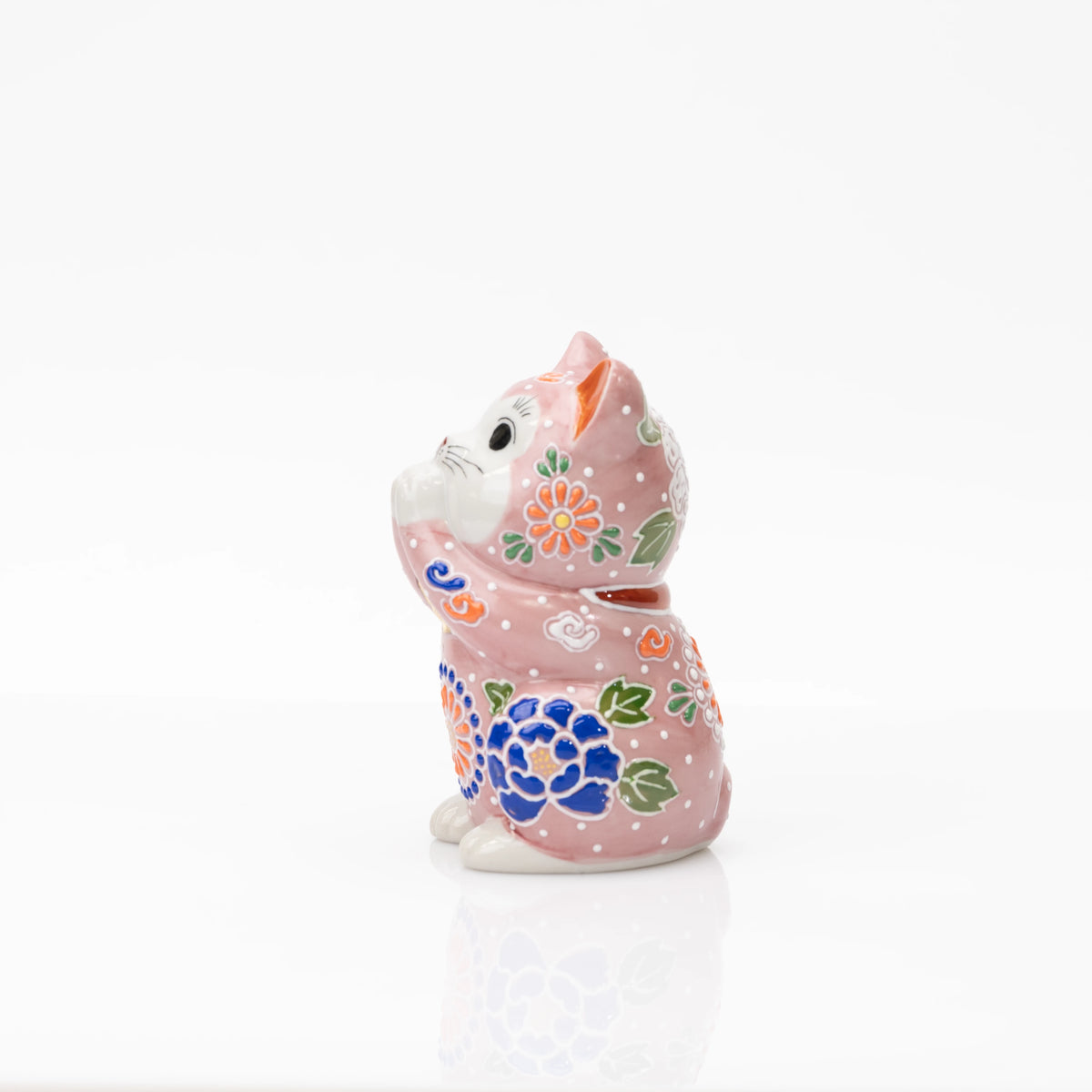 Opposite side of the pink praying cat with blue flowers.