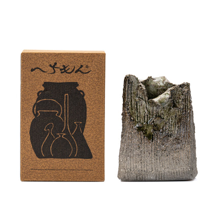 Shigaraki rectangular bud vase beside its brown Hechimon box.