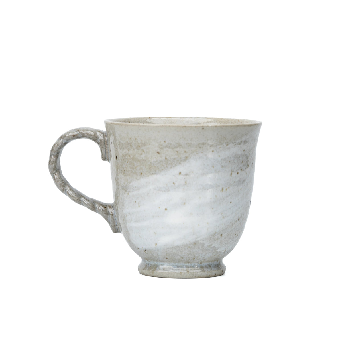 Back view of the Kutani three owls mug and its textured handle.