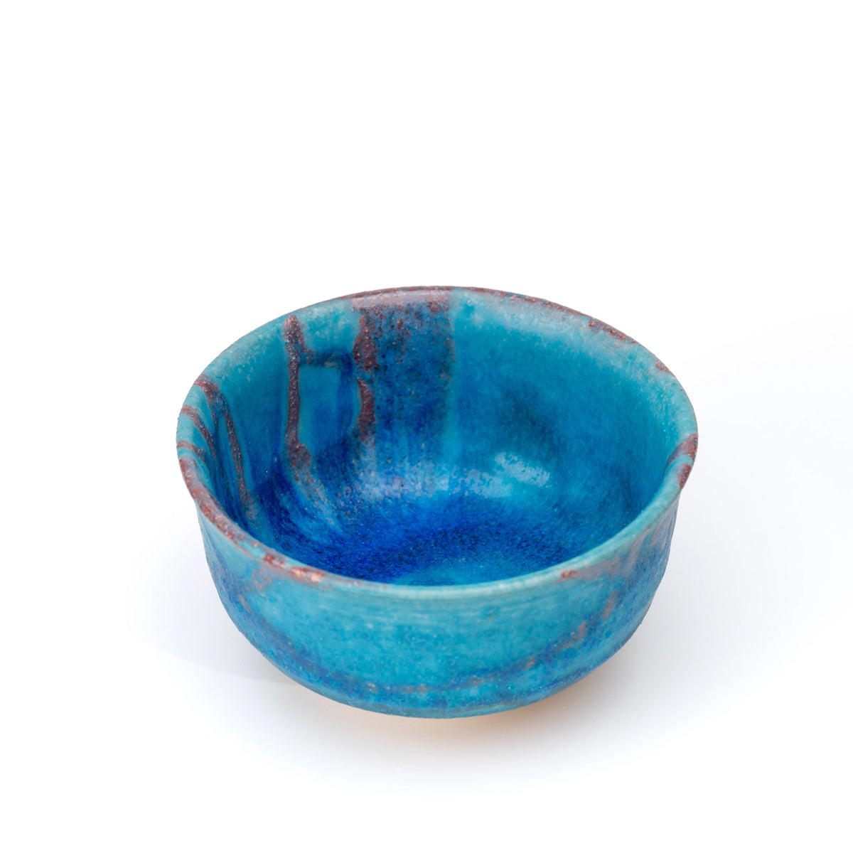 Blue Hechimon matcha bowl with purple-brown glaze bands and a wide opening on white.