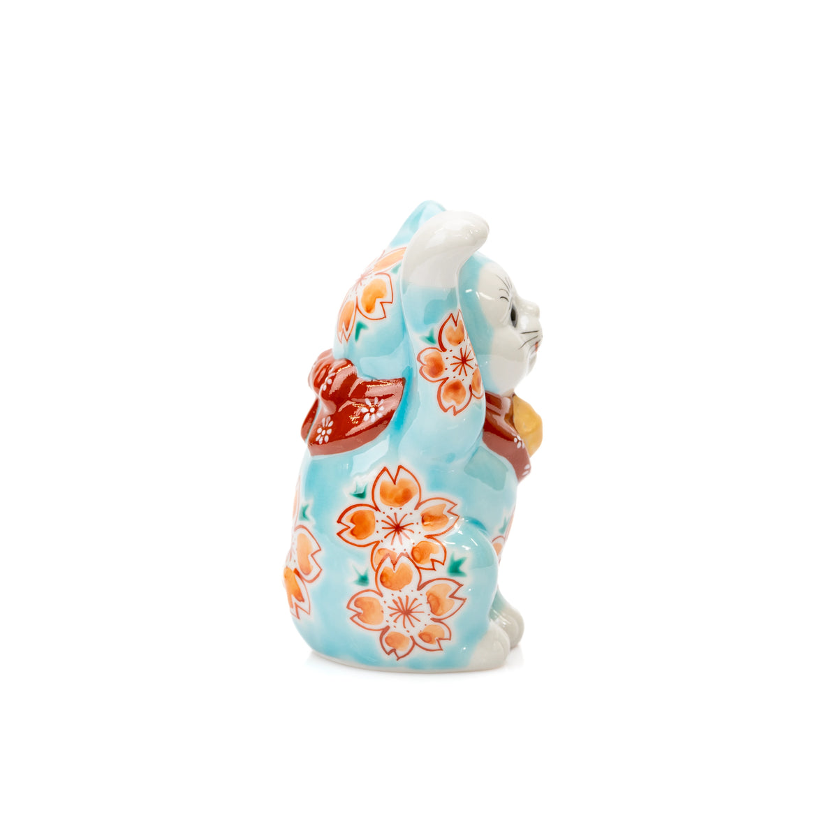Opposite side of the turquoise cat's floral decoration.