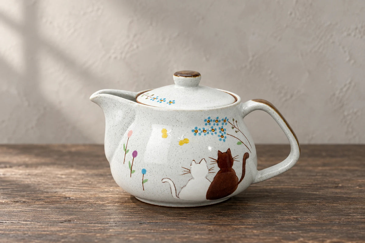 teapots tea sets — selected objects on a wooden studio table.